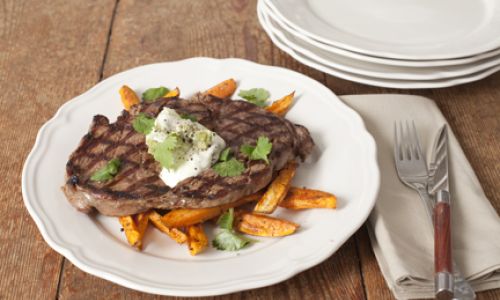 GRIDDLED STEAK WITH CAJUN SWEET POTATO CHIPS & AN AVOCADO & LIME SOUR CREAM